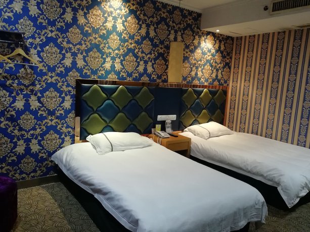 Imagen de la habitación del Hotel Caiyuan. Foto 18