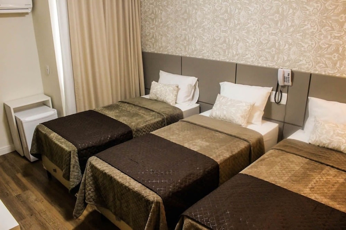 Imagen de la habitación del Hotel Caju De Ouro. Foto 9