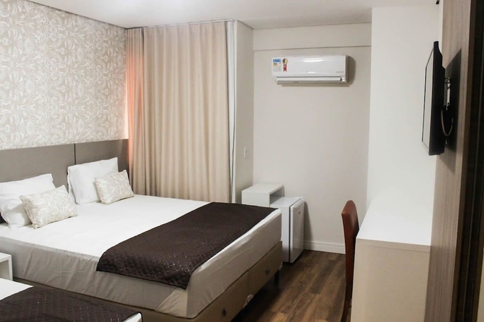Imagen de la habitación del Hotel Caju De Ouro. Foto 10