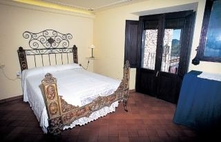 Imagen de la habitación del Hotel Cal Sastre. Foto 2