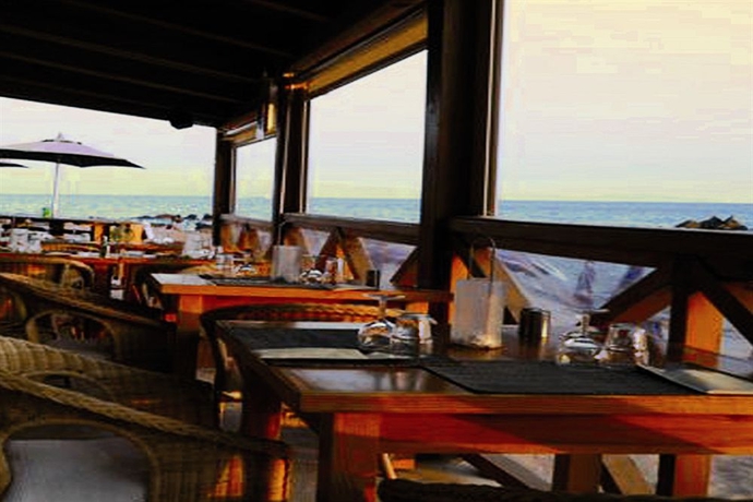 Imagen del bar/restaurante del Hotel Cala Di Sole. Foto 3