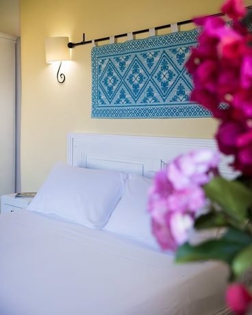 Imagen de la habitación del Hotel Cala Luas Resort. Foto 12