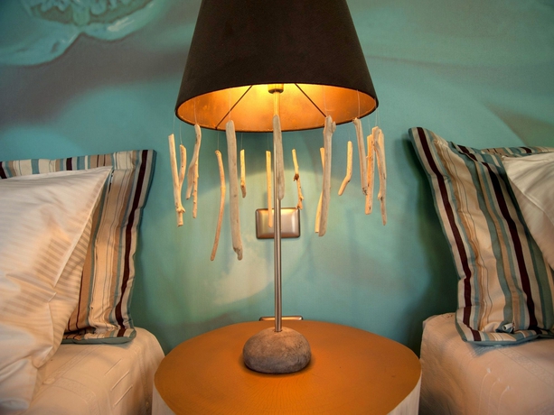 Imagen de la habitación del Hotel Cala Luna Boutique and Villas. Foto 9