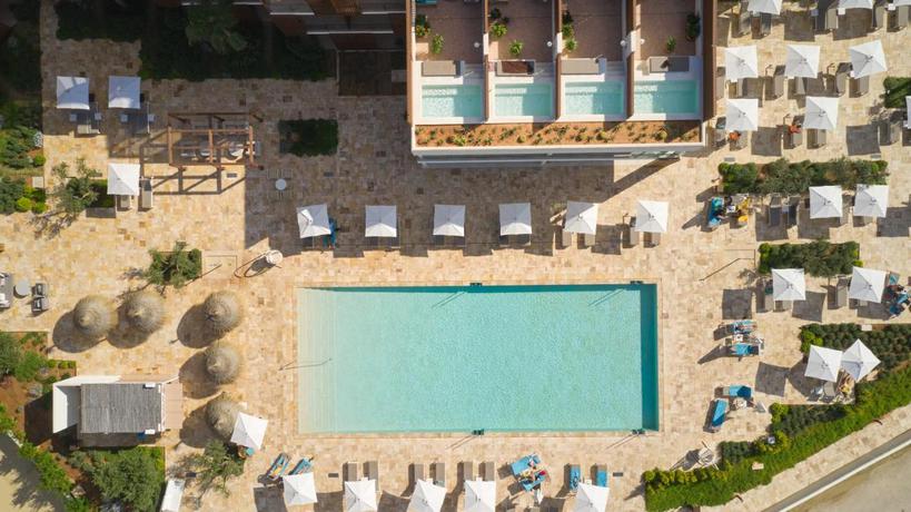 Imagen de la piscina del Hotel Cala San Miguel Ibiza Resort, Adults only, Curio Collection by Hilton. Foto 19