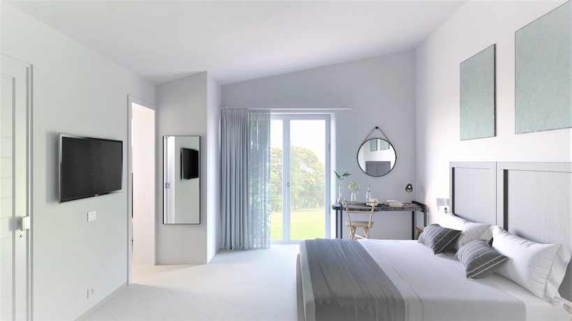 Imagen de la habitación del Hotel Cala Sinzias Resort. Foto 10