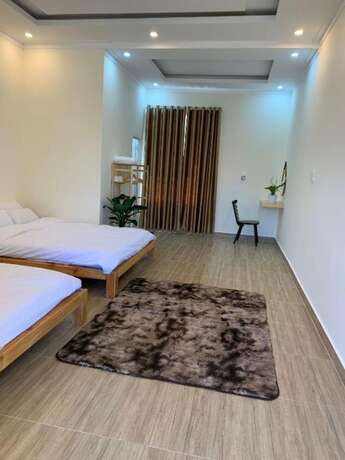 Imagen de la habitación del Hotel Calais Villa. Foto 11