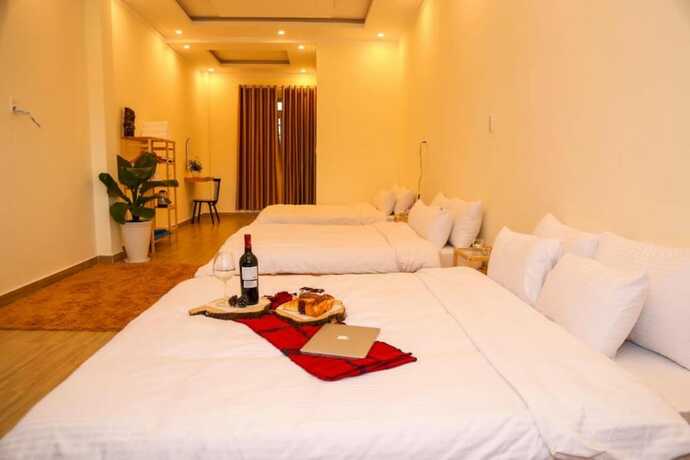 Imagen de la habitación del Hotel Calais Villa. Foto 13