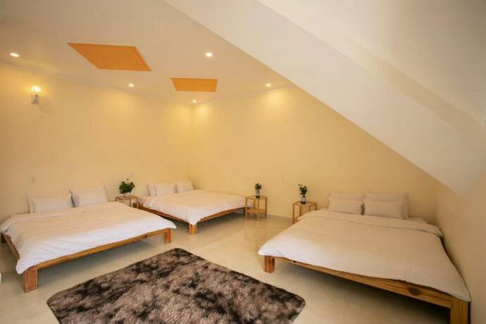 Imagen de la habitación del Hotel Calais Villa. Foto 15