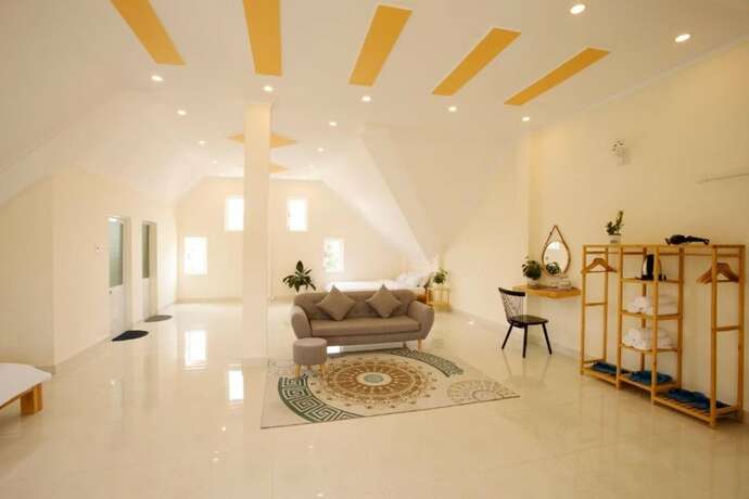 Imagen de la habitación del Hotel Calais Villa. Foto 16