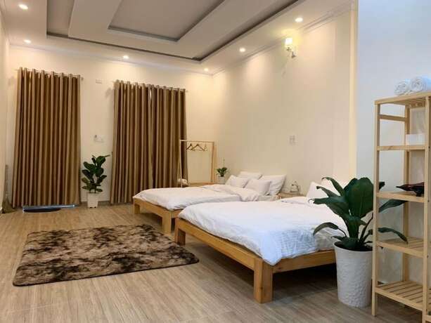 Imagen de la habitación del Hotel Calais Villa. Foto 18