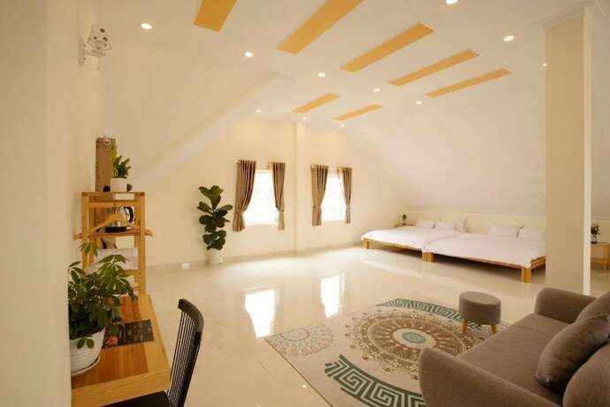 Imagen de la habitación del Hotel Calais Villa. Foto 19