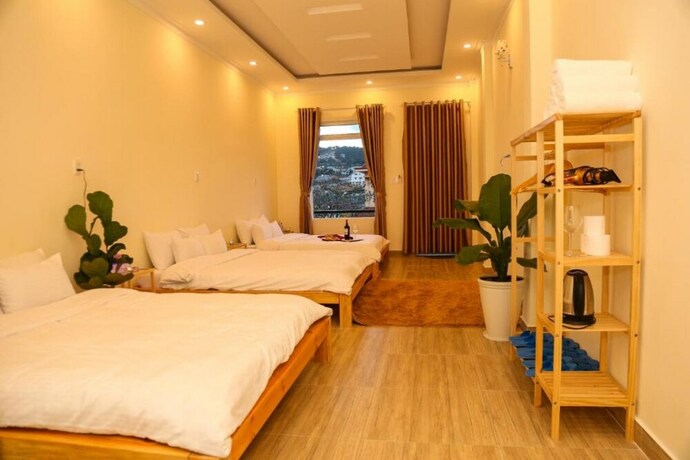 Imagen de la habitación del Hotel Calais Villa. Foto 20