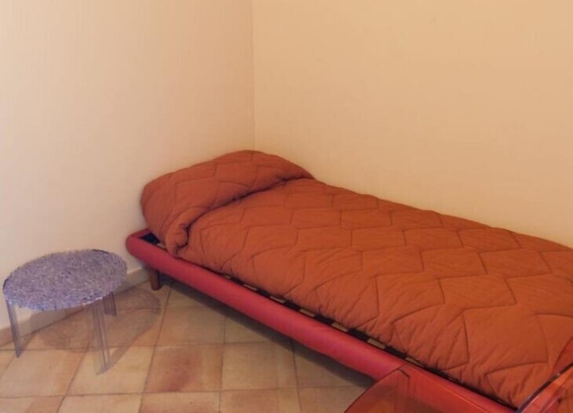 Imagen de la habitación del Hotel Calajò Resort. Foto 7