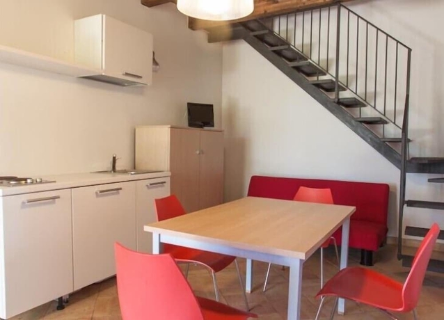 Imagen de la habitación del Hotel Calajò Resort. Foto 11