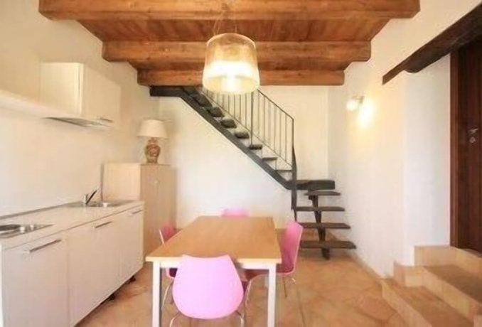 Imagen de la habitación del Hotel Calajò Resort. Foto 12