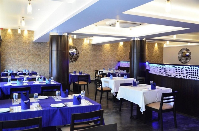 Imagen del bar/restaurante del Hotel Calangute Tower- Am Kollection. Foto 2