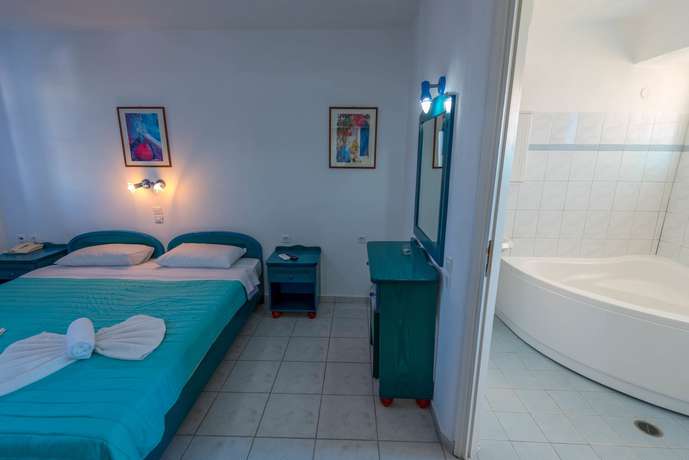 Imagen de la habitación del Hotel Caldera View Resort - Adults Only. Foto 3