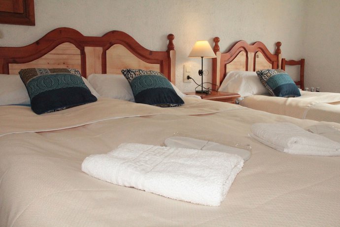 Imagen de la habitación del Hotel Caléndula. Foto 5