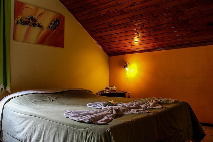 Imagen de la habitación del Hotel Caled&ocirc;nia Inn. Foto 4