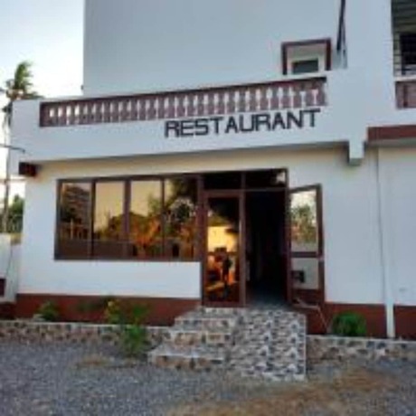 Imagen del bar/restaurante del Hotel CaliTwapa and Restaurant. Foto 1