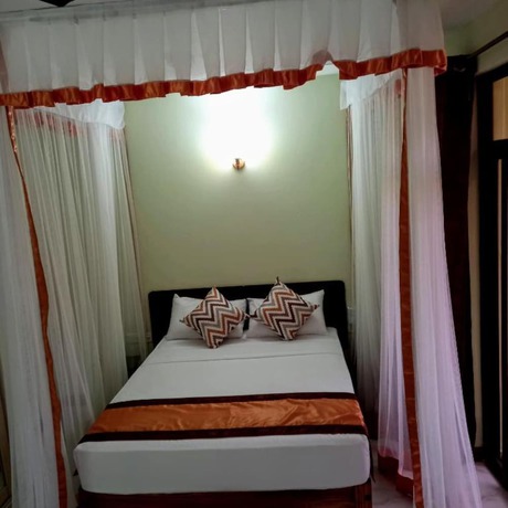 Imagen de la habitación del Hotel CaliTwapa and Restaurant. Foto 12