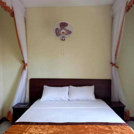 Imagen de la habitación del Hotel CaliTwapa and Restaurant. Foto 15