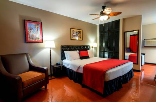 Imagen de la habitación del Hotel Caliente Tropics. Foto 5