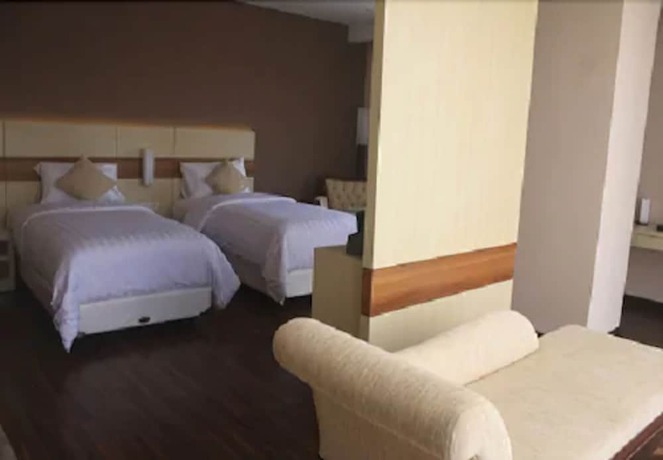 Imagen de la habitación del Hotel California Bandung. Foto 15