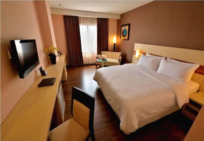 Imagen de la habitación del Hotel California Bandung. Foto 17