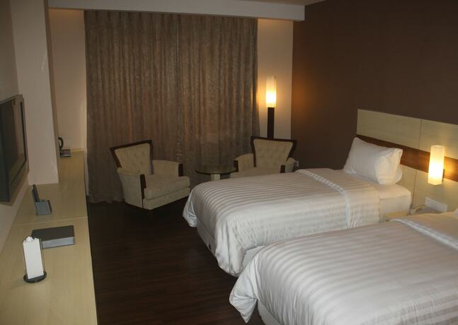 Imagen de la habitación del Hotel California Bandung. Foto 20
