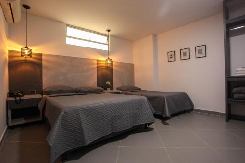Imagen de la habitación del Hotel California Center. Foto 16