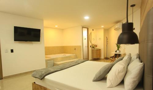 Imagen de la habitación del Hotel California Center. Foto 19