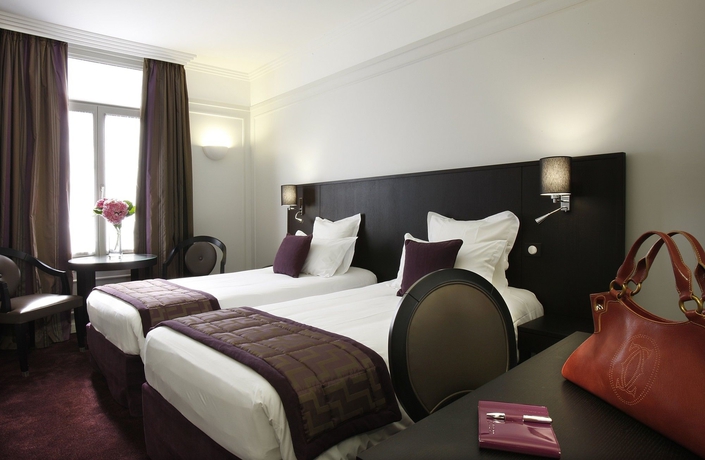 Imagen de la habitación del Hotel California Paris Champs-Elysées. Foto 4