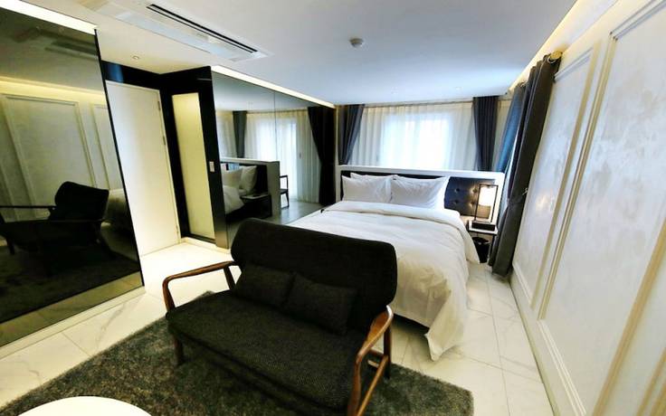 Imagen de la habitación del Hotel California Samsung. Foto 7