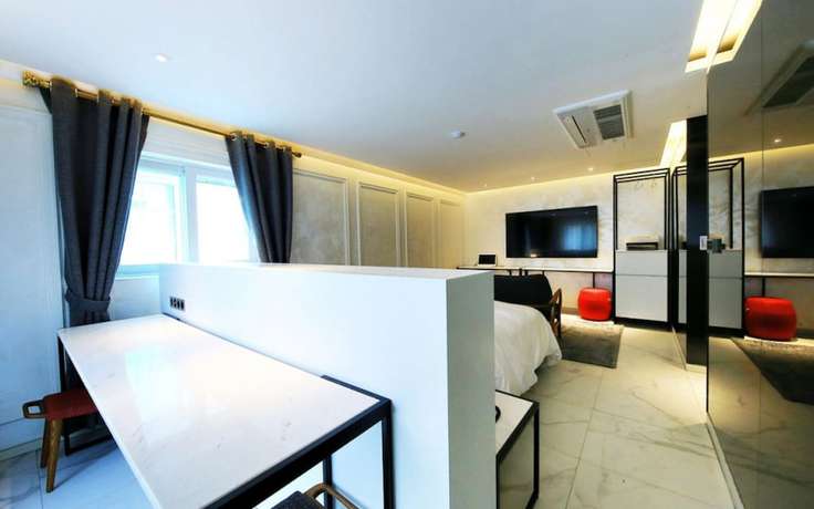 Imagen de la habitación del Hotel California Samsung. Foto 8