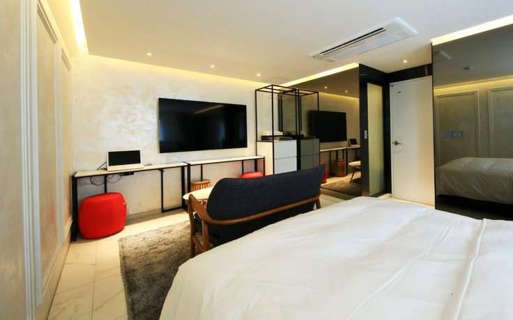 Imagen de la habitación del Hotel California Samsung. Foto 10