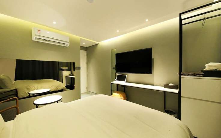 Imagen de la habitación del Hotel California Samsung. Foto 13