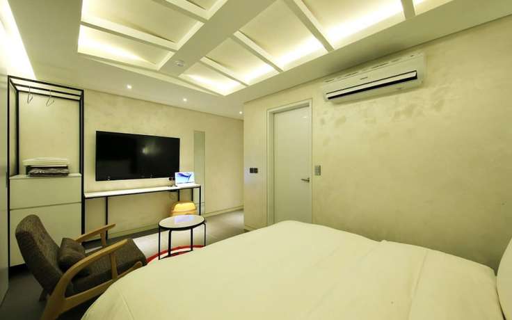 Imagen de la habitación del Hotel California Samsung. Foto 14