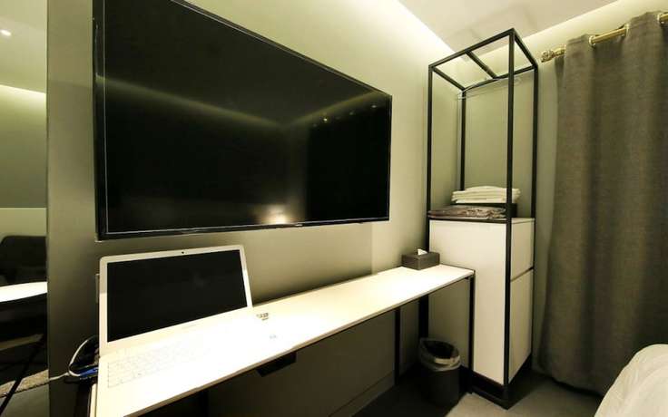 Imagen de la habitación del Hotel California Samsung. Foto 16