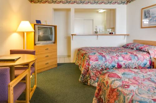 Imagen de la habitación del Hotel California Suites. Foto 13