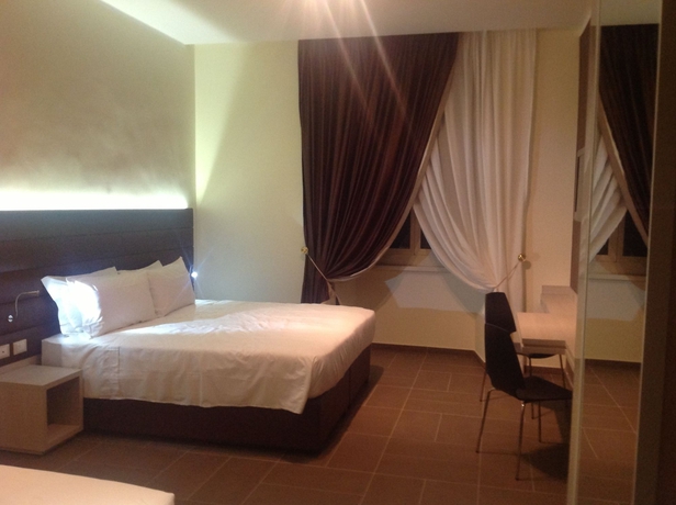 Imagen de la habitación del Hotel California, Termini. Foto 5