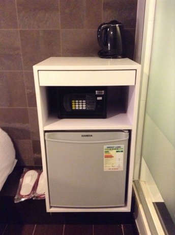 Imagen de la habitación del Hotel California, Tsim Sha Tsui. Foto 8