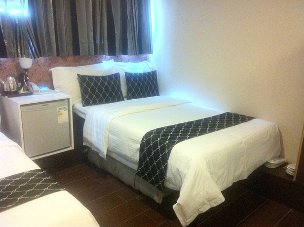 Imagen de la habitación del Hotel California, Tsim Sha Tsui. Foto 9
