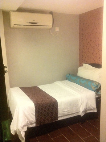 Imagen de la habitación del Hotel California, Tsim Sha Tsui. Foto 10