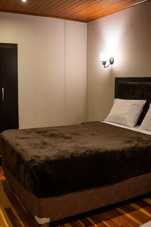 Imagen de la habitación del Hotel California Urubamba. Foto 18