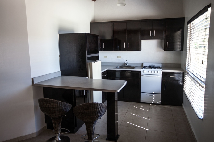 Imagen de la habitación del Hotel California Villas Y. Foto 16