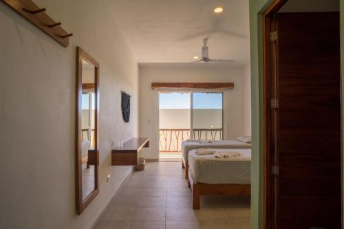Imagen de la habitación del Hotel Caliza Tulum. Foto 3