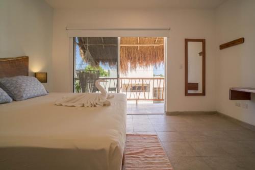 Imagen de la habitación del Hotel Caliza Tulum. Foto 5
