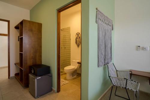 Imagen de la habitación del Hotel Caliza Tulum. Foto 7