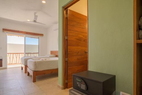 Imagen de la habitación del Hotel Caliza Tulum. Foto 9